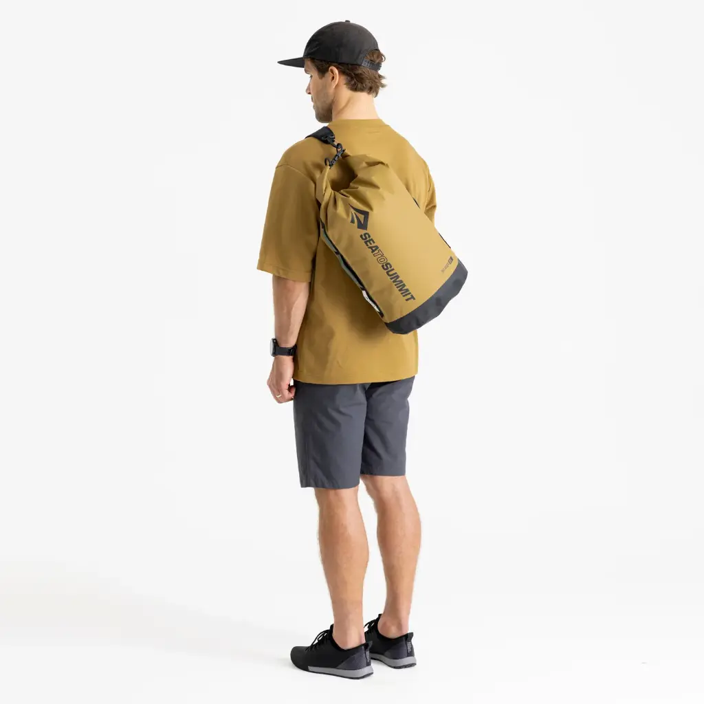 00_BigRiverDryBag20LDullGoldStrapBackView.webp